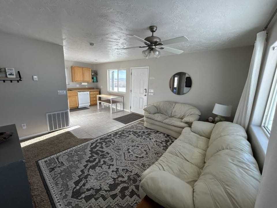 View of living room from laundry closet