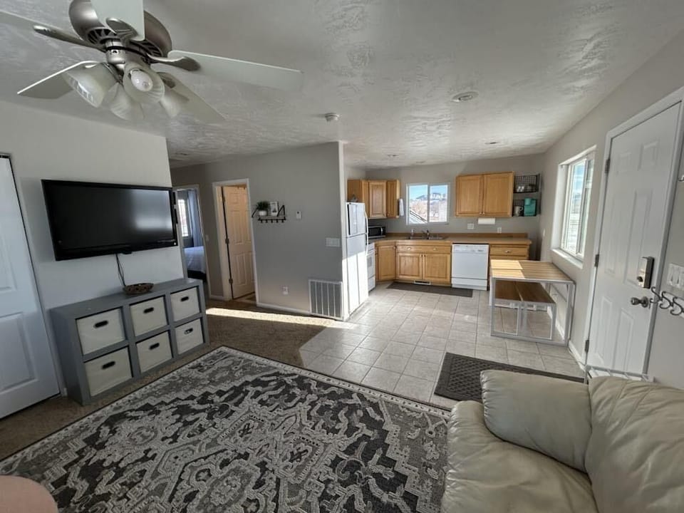 View of kitchen from corner of living room