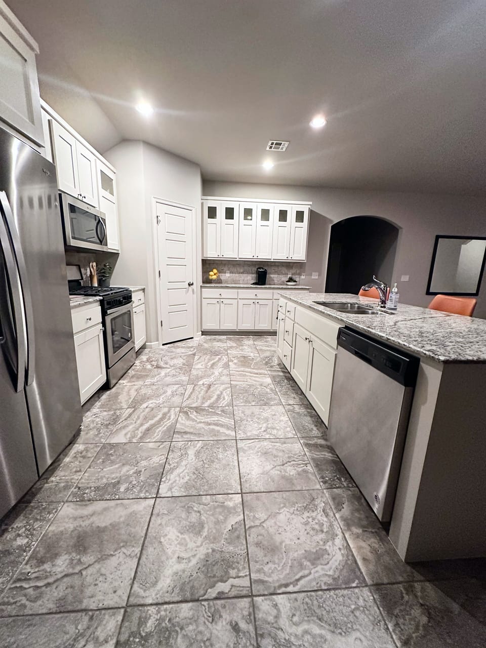 Kitchen comes equipped with top of the line appliances. 