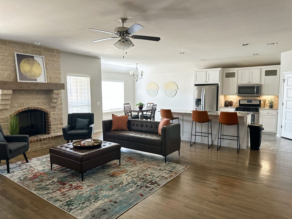 Living area, kitchen and dining.