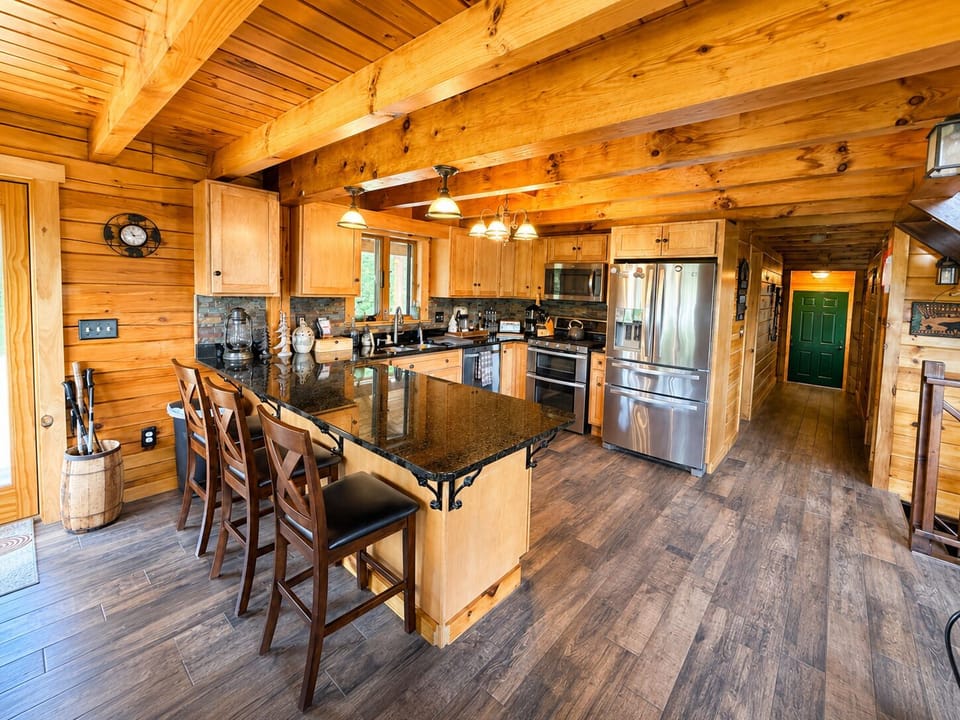 Modern Kitchen with stainless steel appliances & granite countertops.