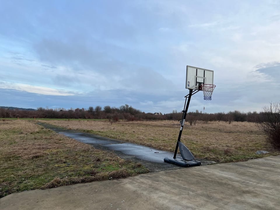 Basketball! Path goes to runway, so we ask folks not to pass basketball hoop.
