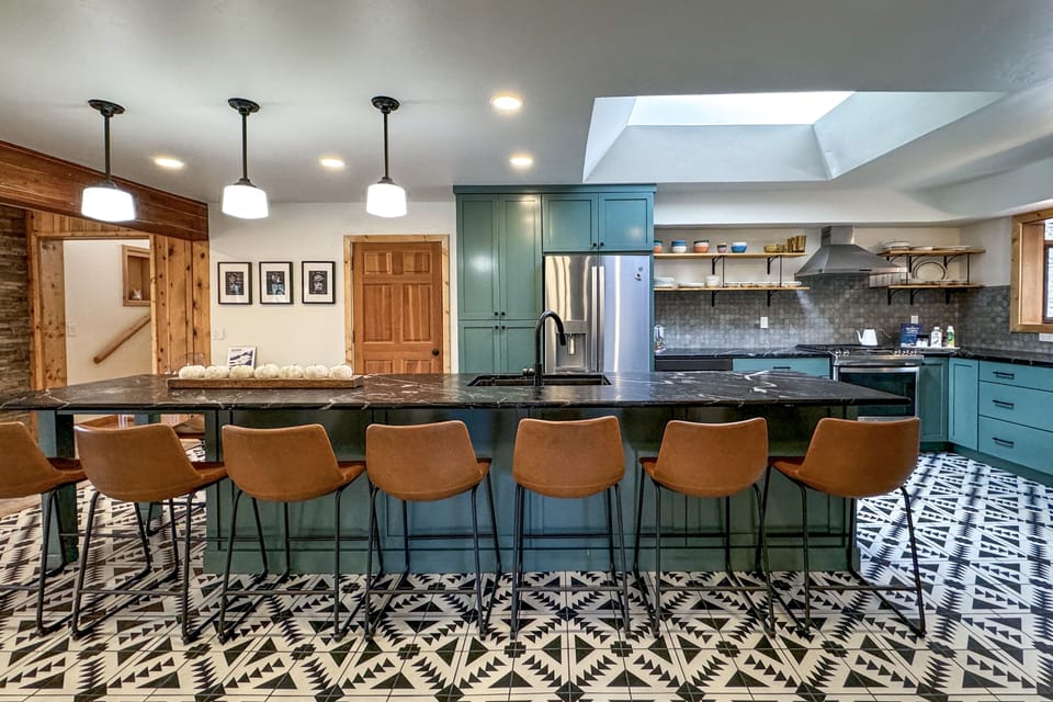 Kitchen with counter dining.