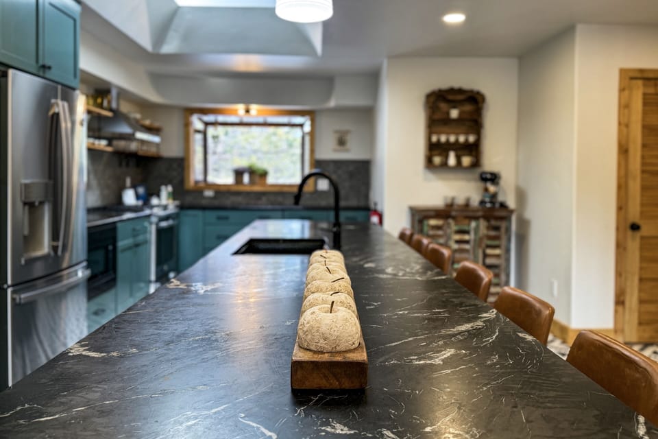 Open floor plan to kitchen and counter dining.