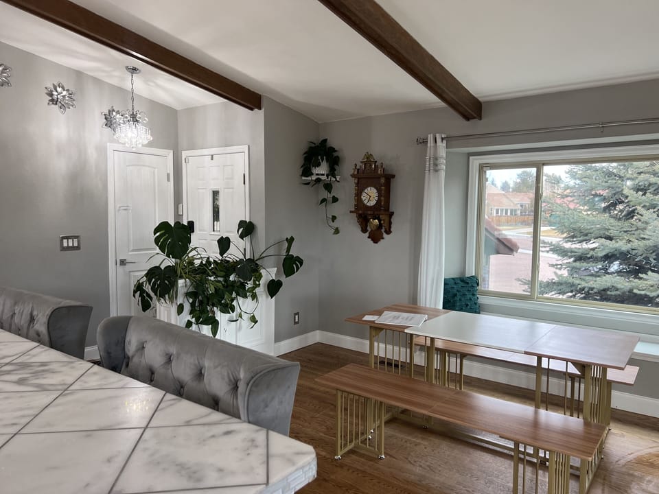 Dinning room table with bench seating located in the kitchen