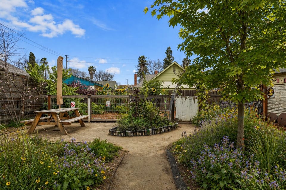 Enjoy our spacious backyard with a patio, picnic table, and a dedicated pet area. Surrounded by native plants and fruit trees, it’s a comfortable, relaxed space to spend time outdoors.