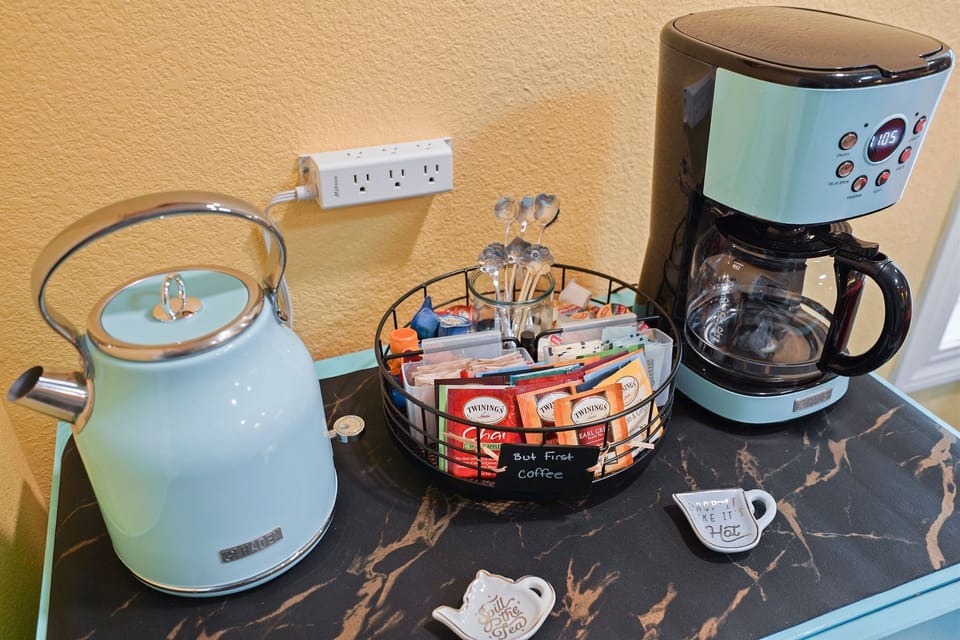 Fuel your day with a cozy cup! Our coffee and tea station is stocked with a selection of premium beans, assorted teas, and all the necessary accoutrements for your perfect brew. ☕✨