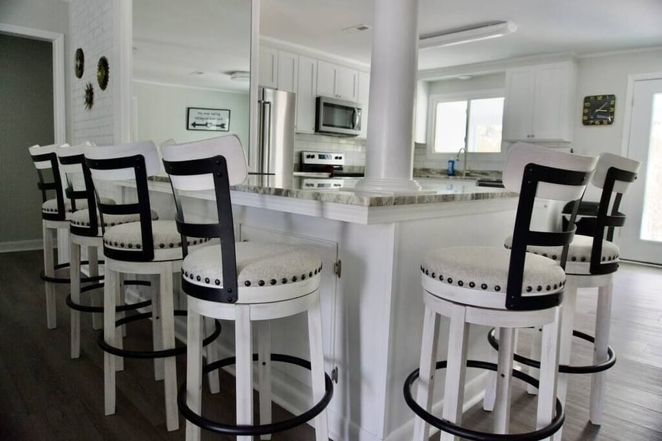 Spacious kitchen island offers additional seating options