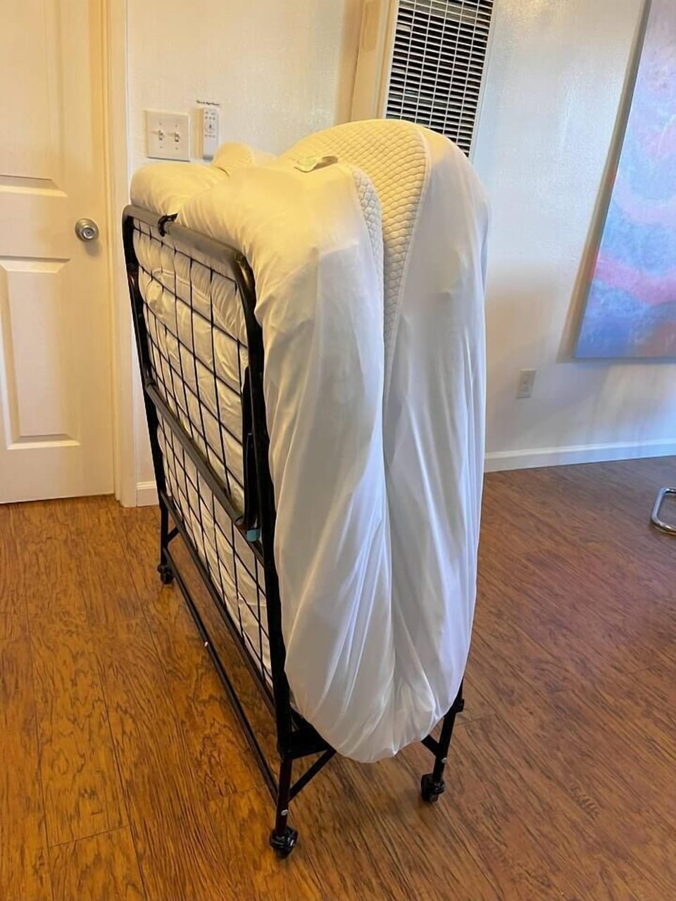 The rollaway beds can be folded up and stored in the laundry room.