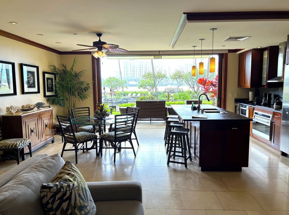 First unit: Enjoy meals in a dining area that opens to the fresh ocean breeze through sliding doors