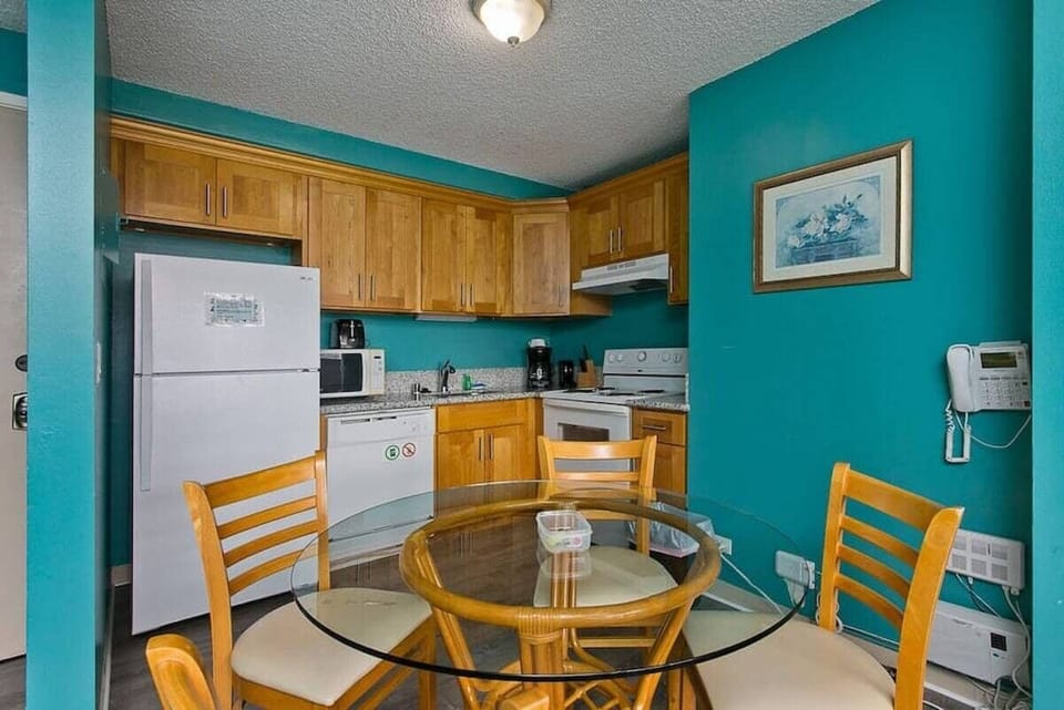 First unit kitchen and dining areas