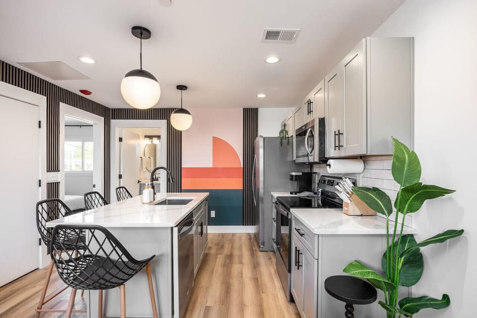 Lots of natural light and color in this recently updated condo. High-end kitchen appliances and all the utensils you might need to make a meal.