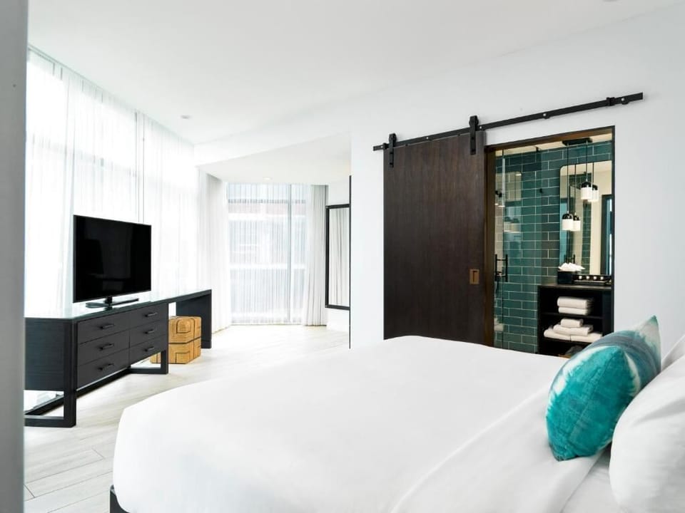 Sink into airy luxury with open layout and spa-style vibe.