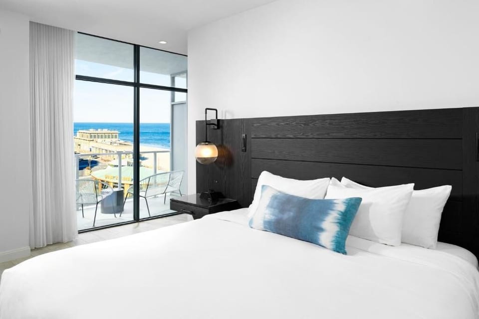 Step onto the balcony and breathe in fresh sea air.