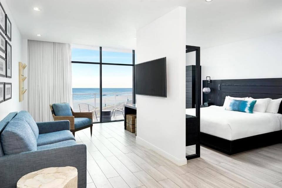 Lounge by floor-to-ceiling windows and watch the waves roll.