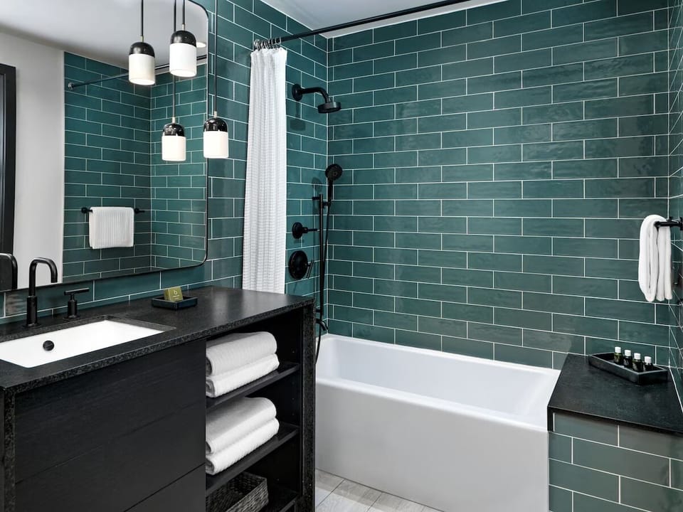 Soak away stress in a deep tub with modern finishes.