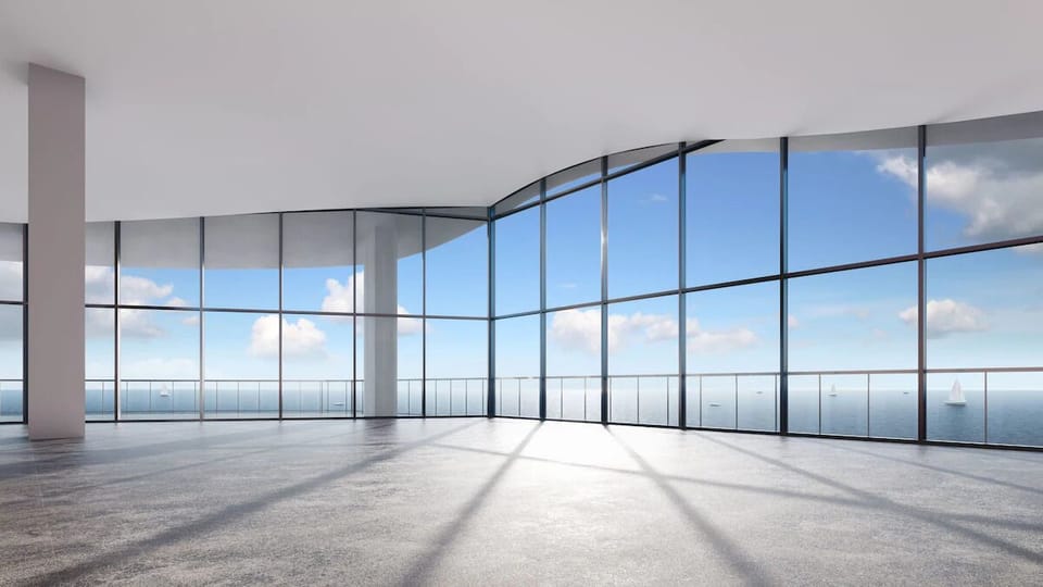 Soak in sweeping ocean panoramas through dramatic floor-to-ceiling glass.