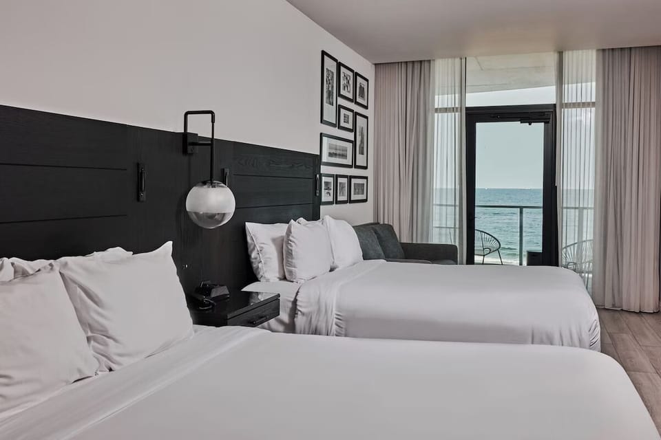 Drift off to ocean views framed by floor-to-ceiling windows.