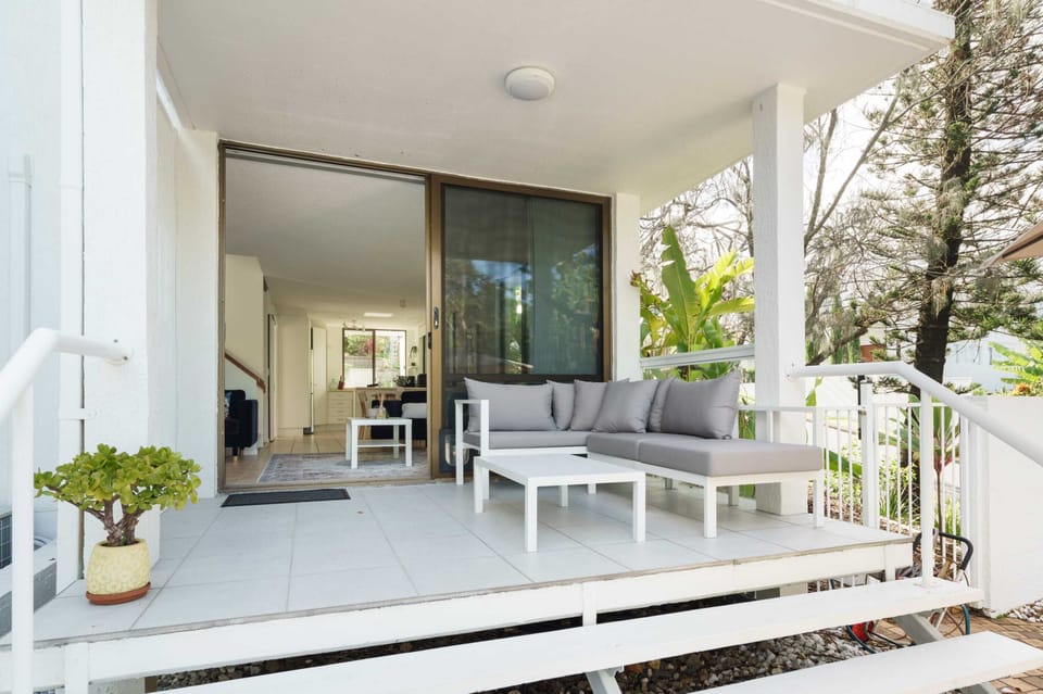 Charming coastal townhouse positioned just steps from beautiful Shelly Beach