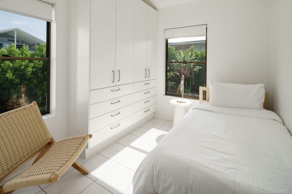 Comfortable third bedroom featuring a single bed and additional trundle bed