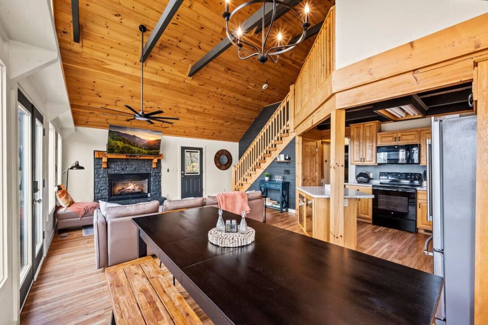 Full-sized dining table is conveniently located near the kitchen. It`s a great place to enjoy meals together.