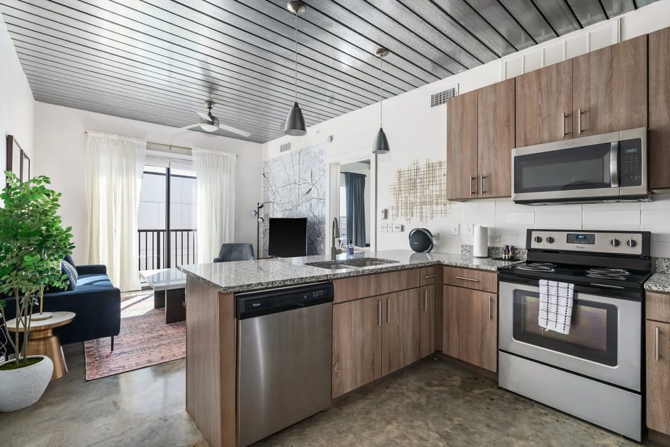 Craft tasty dishes in this contemporary kitchen with all the necessary amenities.