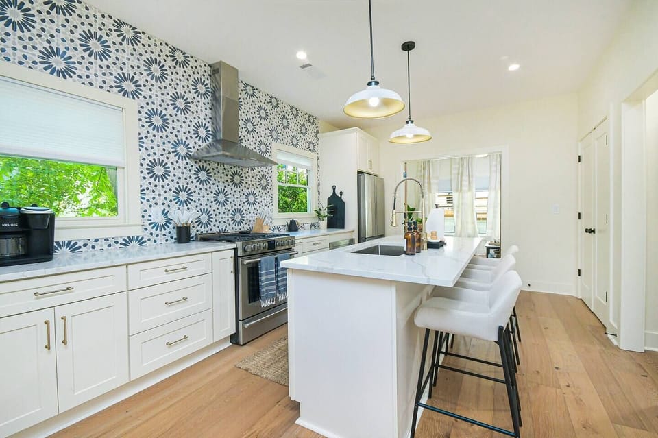 Have a few drinks at the kitchen island while watching the designated chef in action.