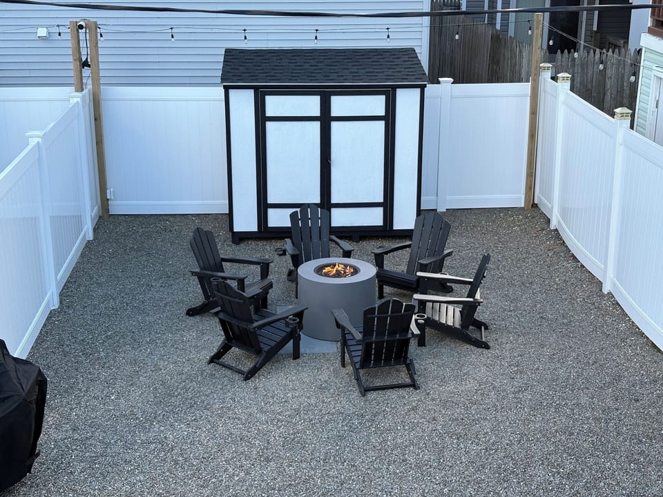 Outdoor sitting area for unit 1. 
6 Adirondack chairs with fire pit