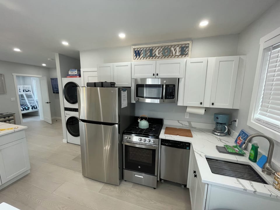Fully equipped kitchen with stainless steel appliances 