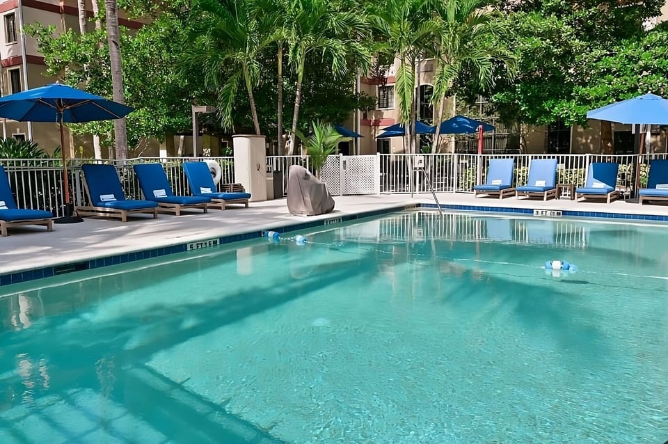 Dive into sparkling water, then stretch out on loungers.