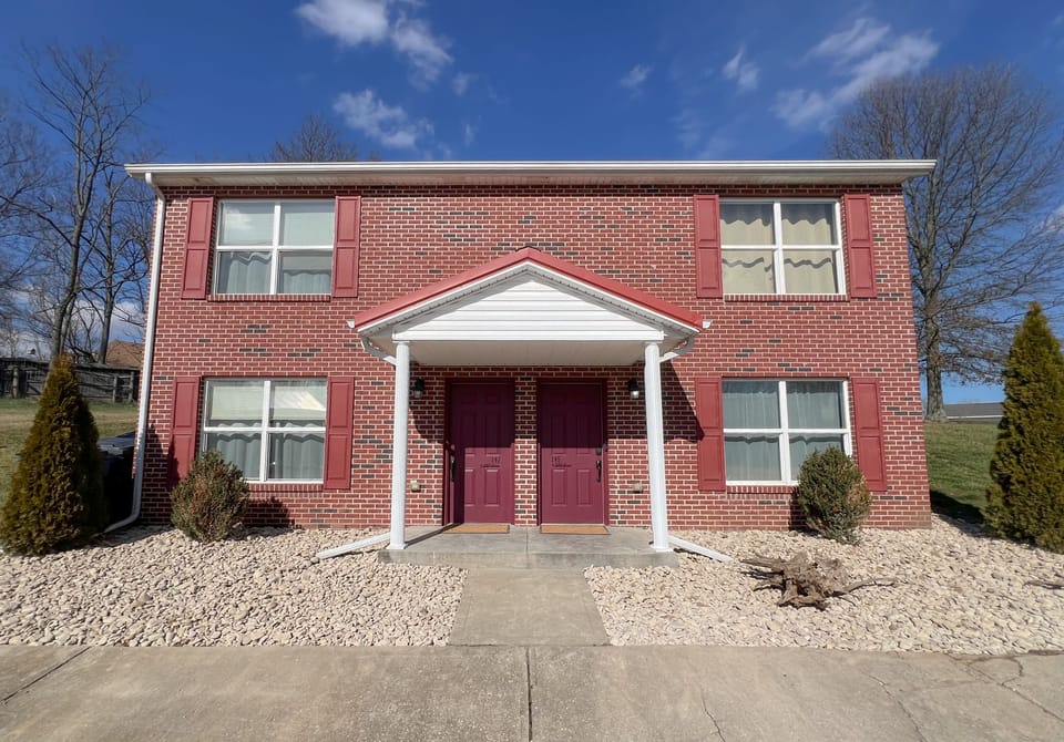 Exterior. The Olive Tree Oasis is on the right side. 