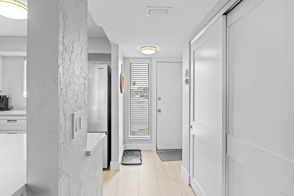Front door- kitchen on left- pantry on right