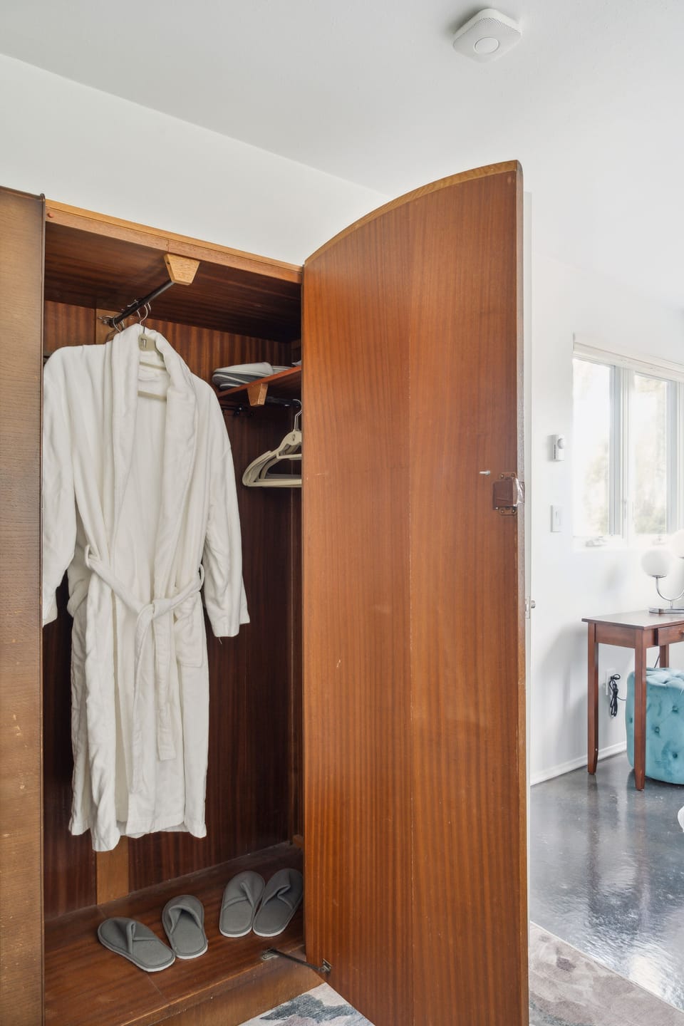 Robes and slippers in each bedroom as well as suitcase stands.