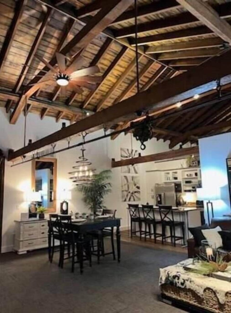 The large open concept gathering area was formerly a hayloft in this 1860 stable