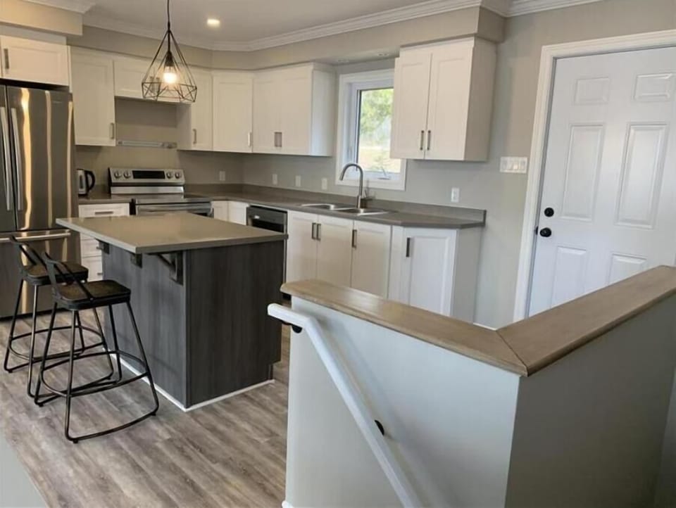 Modern kitchen with stainless steel appliances