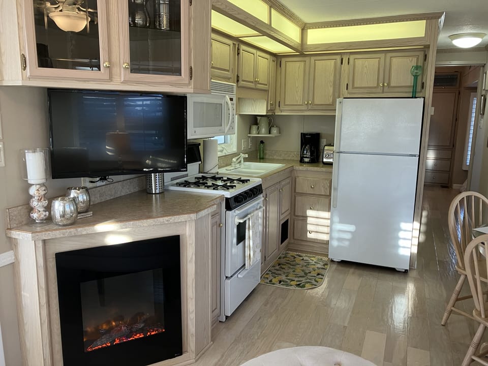Kitchen with dining and fireplace.
