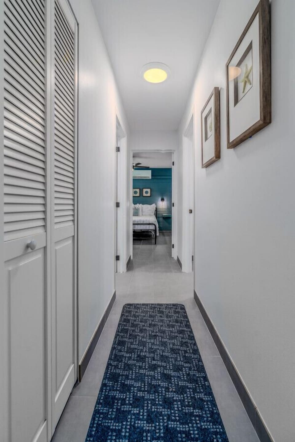 The hallway from the living room to the bedrooms