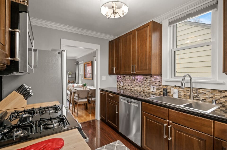 Full kitchen with stainless steel appliances