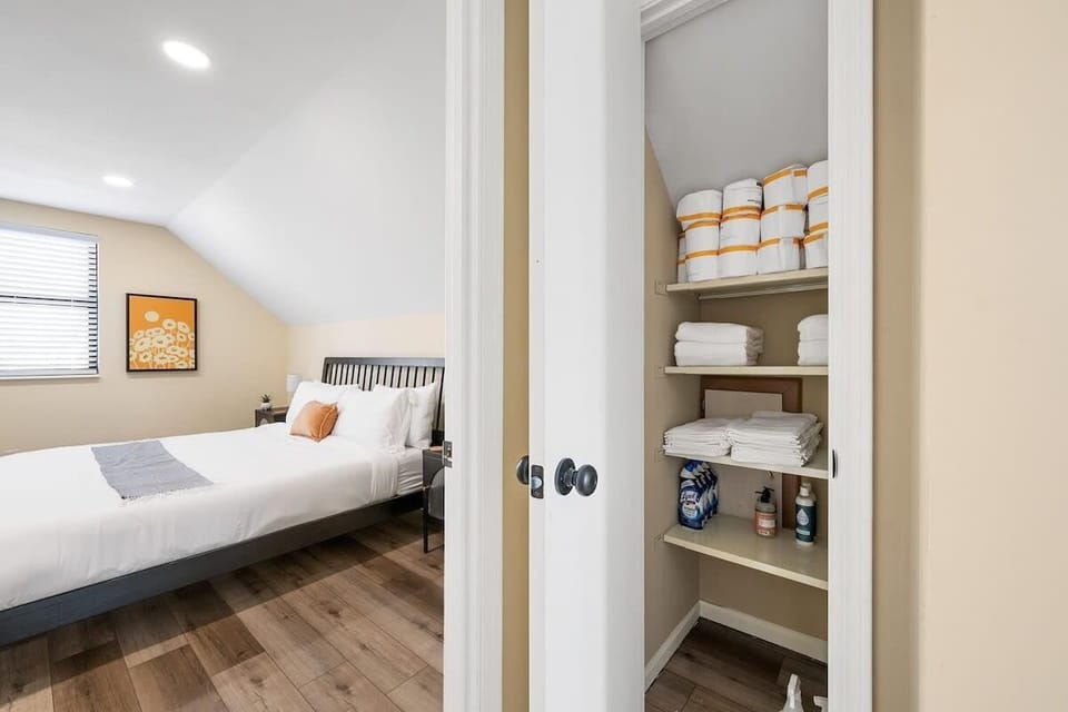 Embrace the comfort of this bedroom retreat featuring a stylish bed beckoning you to relax and unwind, alongside a sleek closet ready to house your entire wardrobe collection.  #SleepInStyle #ClosetGoals #CozyCorner