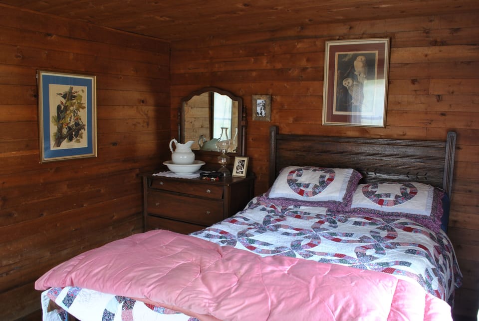 bedroom #1 with full bed and Audubon prints
