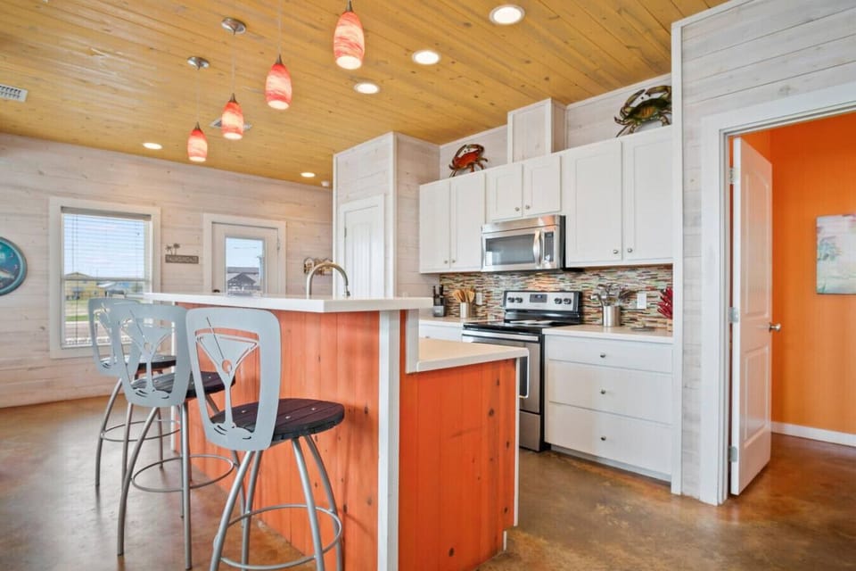 `Whip up seaside snacks in this breezy, beach-style kitchen!`