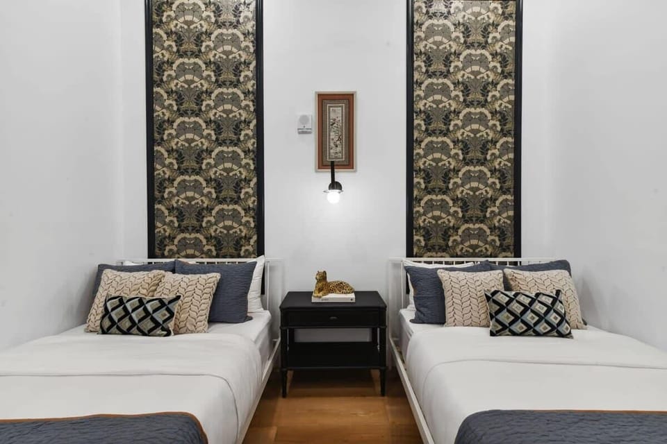 Bedroom 2 | Two Full Beds | Suite 101 First Floor