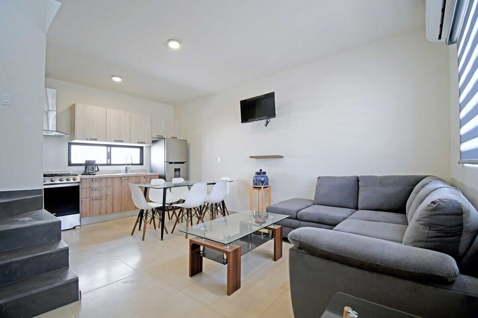 A wall-mounted TV for at-home entertainment