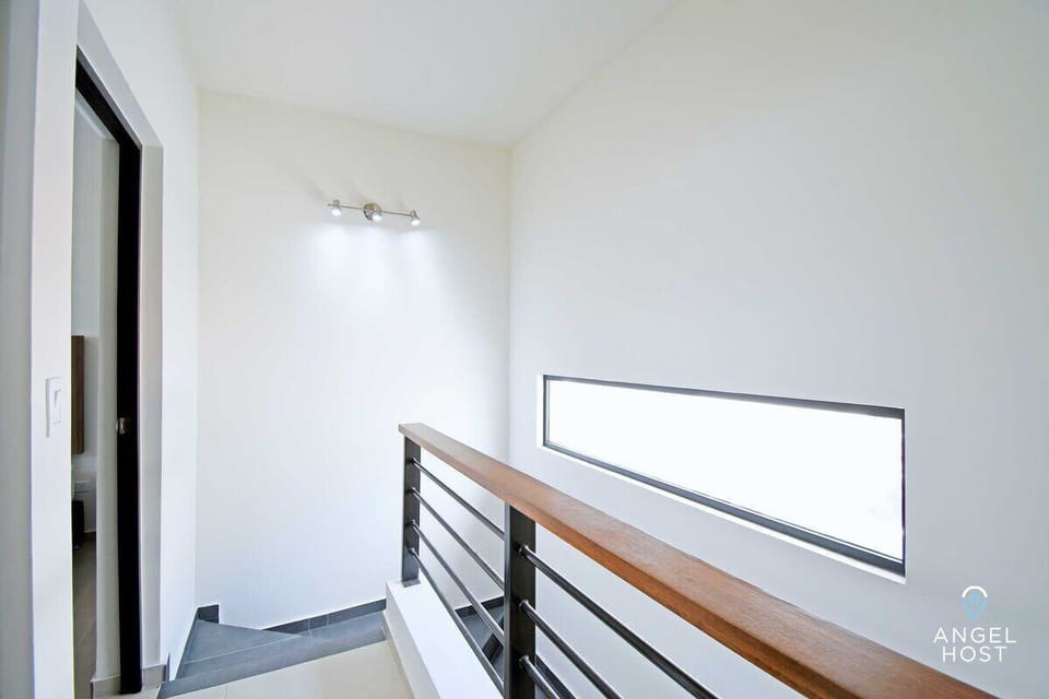 The long window lets in lots of sunlight