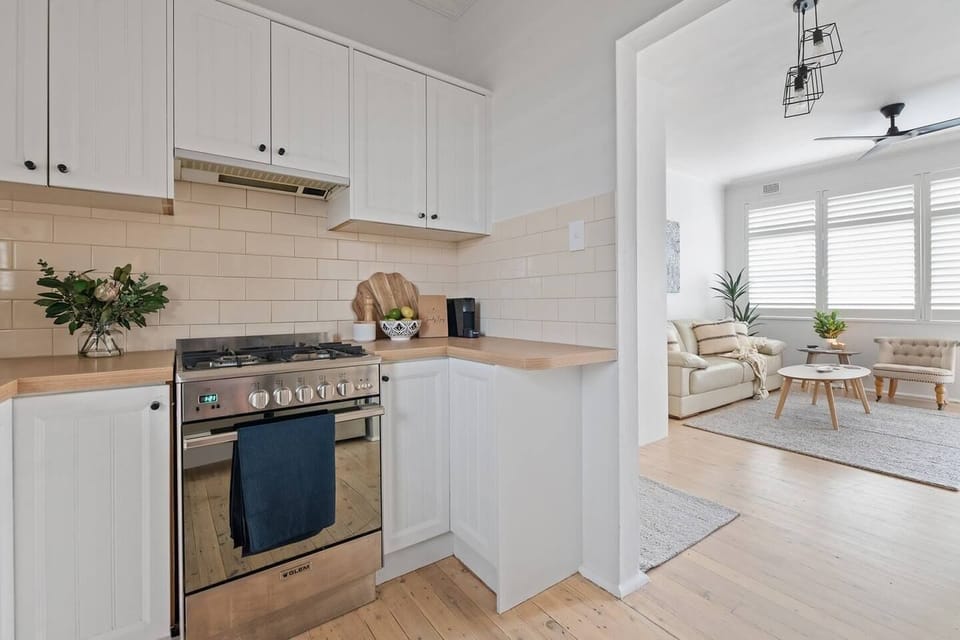 Effortlessly entertain in the fully equipped kitchen, seamlessly connected to the living and dining area for gatherings that feel just like home.