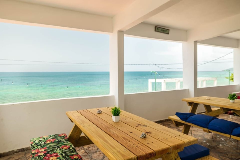 Access to private terrace with uninterrupted view to Esperanza Bay. 