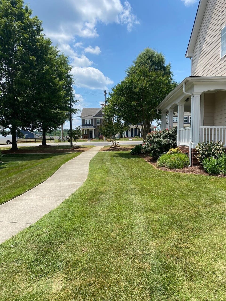 Side yard. Walkway to greenway