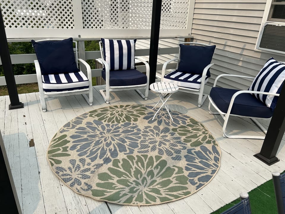 Upper level deck with a gazebo with cover for shade on sunny days