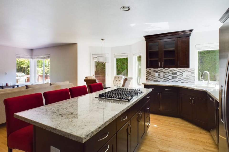 Kitchen with family room and plenty of seating.