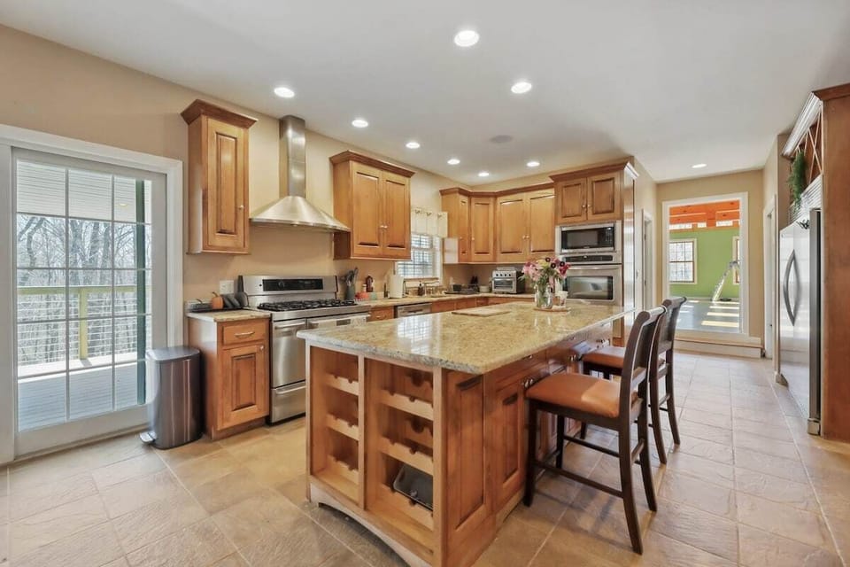 Large kitchen with central island.